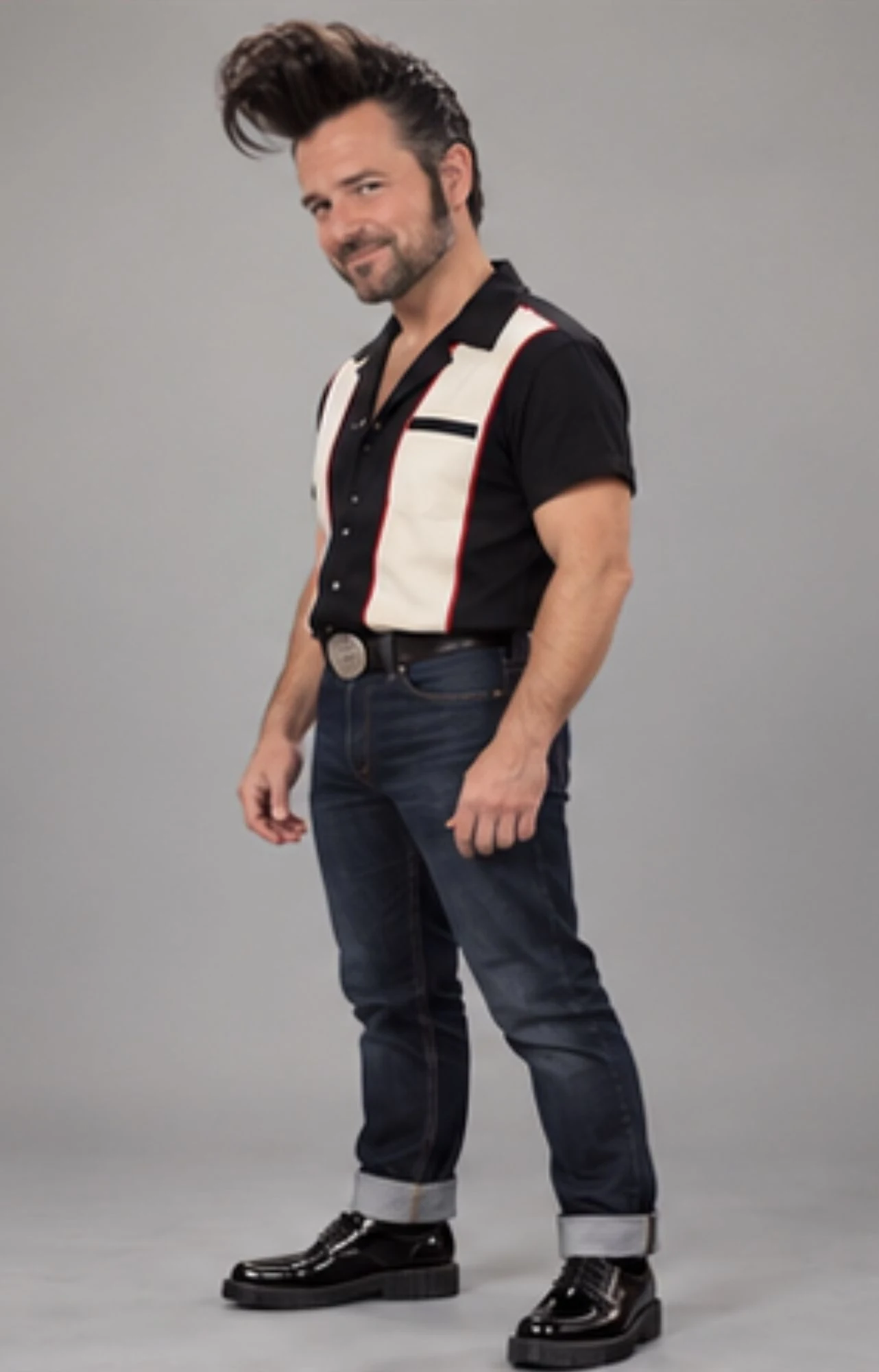 Bennie Bravo, full length: bowling shirt, cuffed raw denim, patent creepers and a big silver buckle